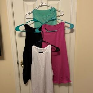 4 EUC Lululemon Swiftly high neck tanks. Size 10